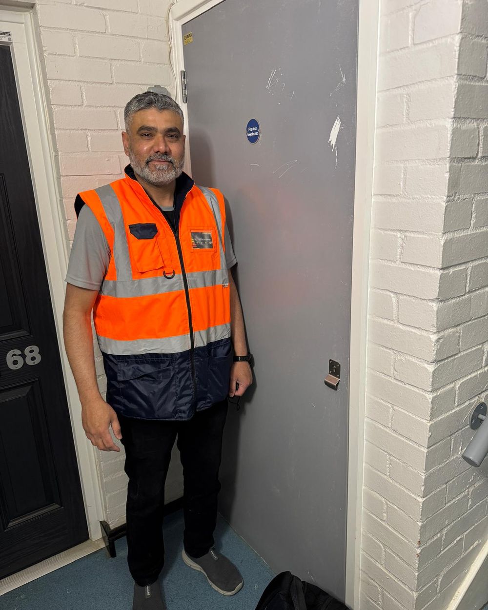 Naseem Jana carrying out an on-site property inspection in Bedford